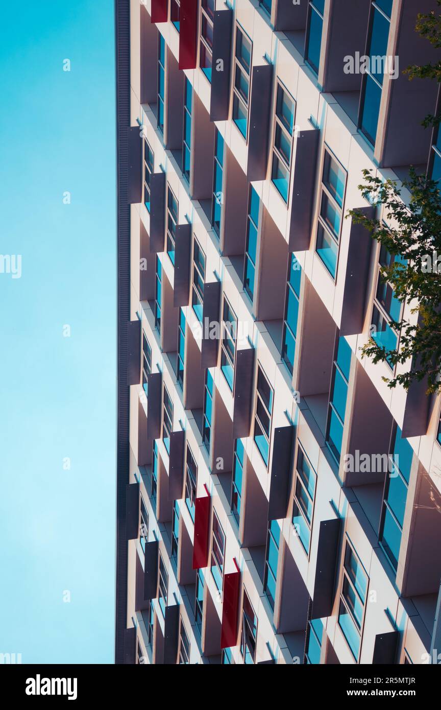 a angled photography of a high rise building showing strong vertical