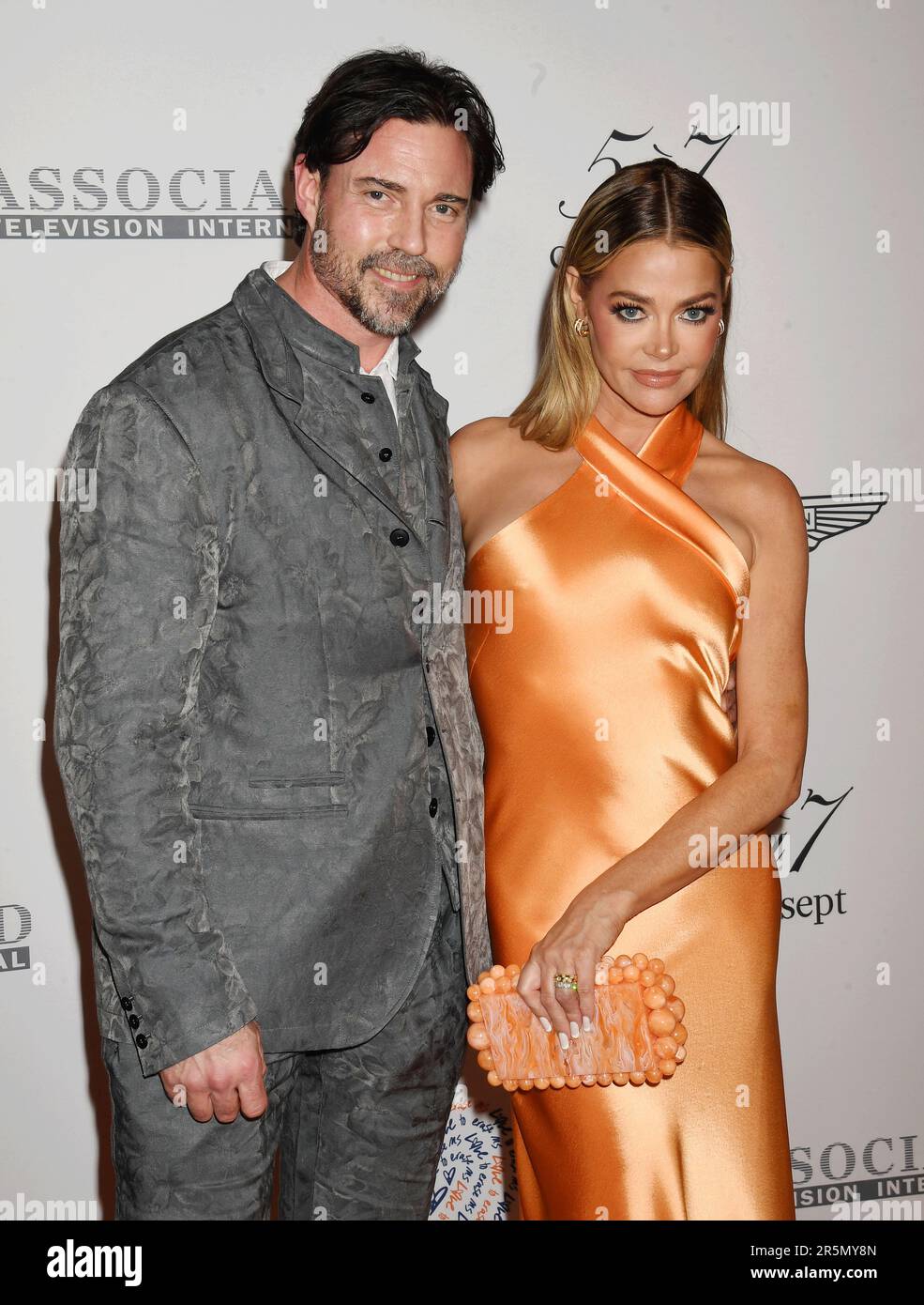 LOS ANGELES, CALIFORNIA - JUNE 02: (L-R) Aaron Phypers and Denise Richards attend the 30th Annual Race To Erase MS Gala at Fairmont Century Plaza on J Stock Photo