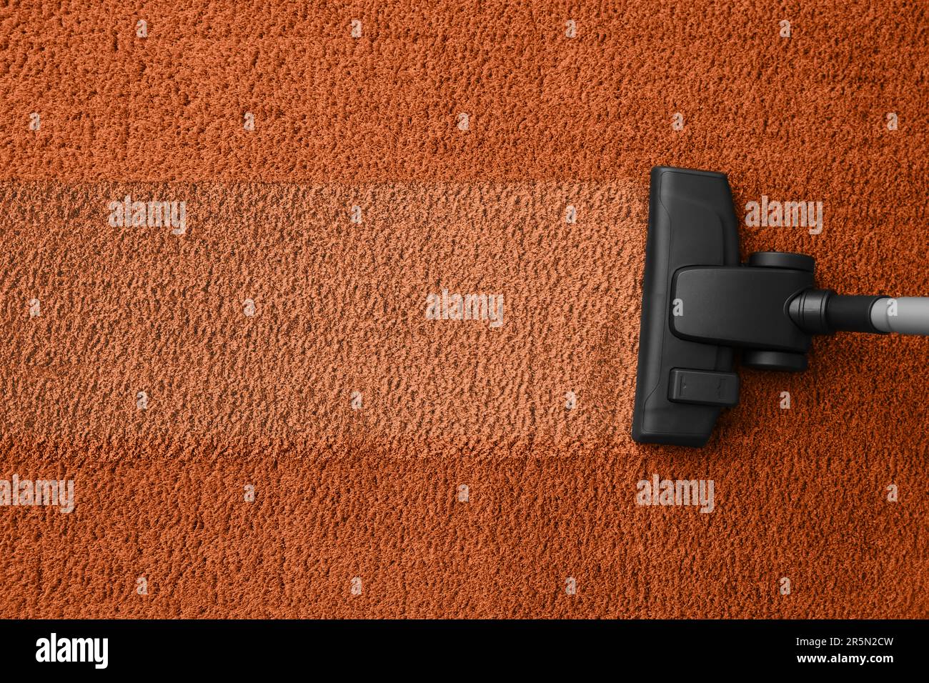 Vacuuming carpet. Clean area after using device, top view Stock Photo Alamy