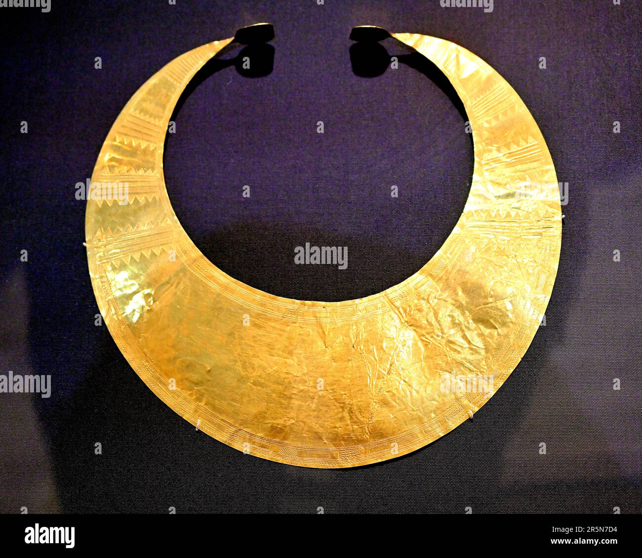British Museum touring display of Bronze age gold relic the 4,000 year old crescent shaped