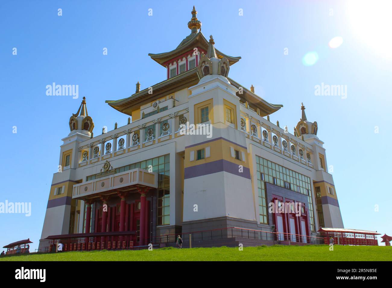 Buddhist temple 'Golden Abode of Buddha Shakyamuni' against a blue sky. Elista, Kalmykia, Russia, copy space for text Stock Photo
