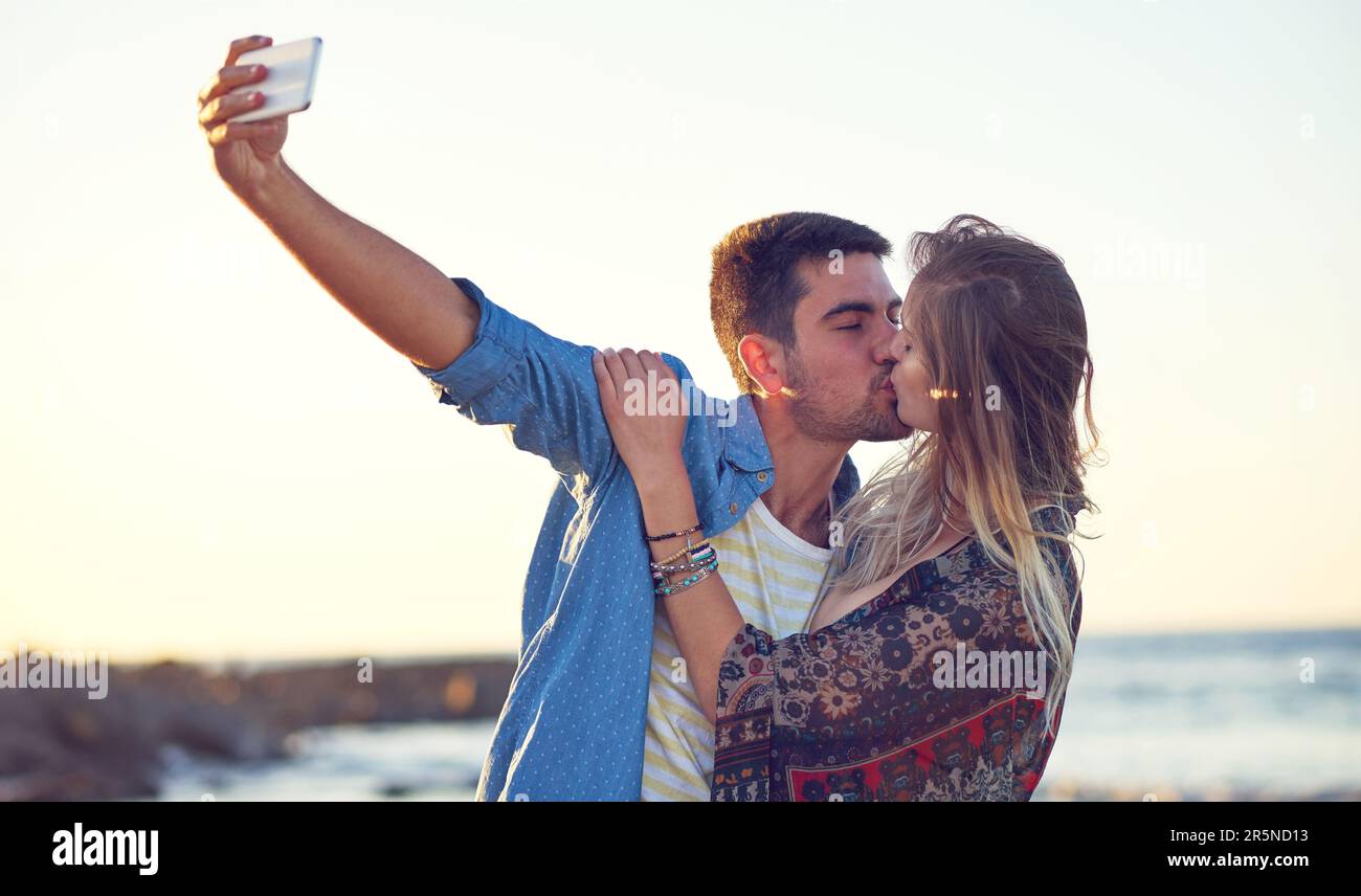 selfies-for-the-summer-album-an-happy-young-couple-taking-selfies-at