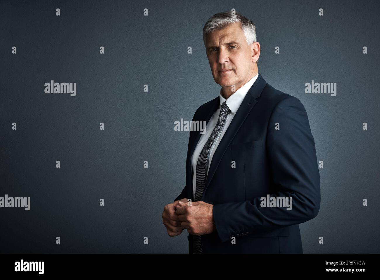 Hes a man of action studio shot of a mature businessman posing against