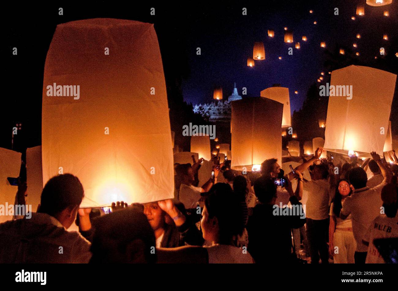 Magelang, Indonesia. 4th June, 2023. People release sky lanterns during the Vesak Day celebration at Borobudur temple in Magelang, Central Java, Indonesia, on June 4, 2023. Credit: Agung Supriyantoo/Xinhua/Alamy Live News Stock Photo