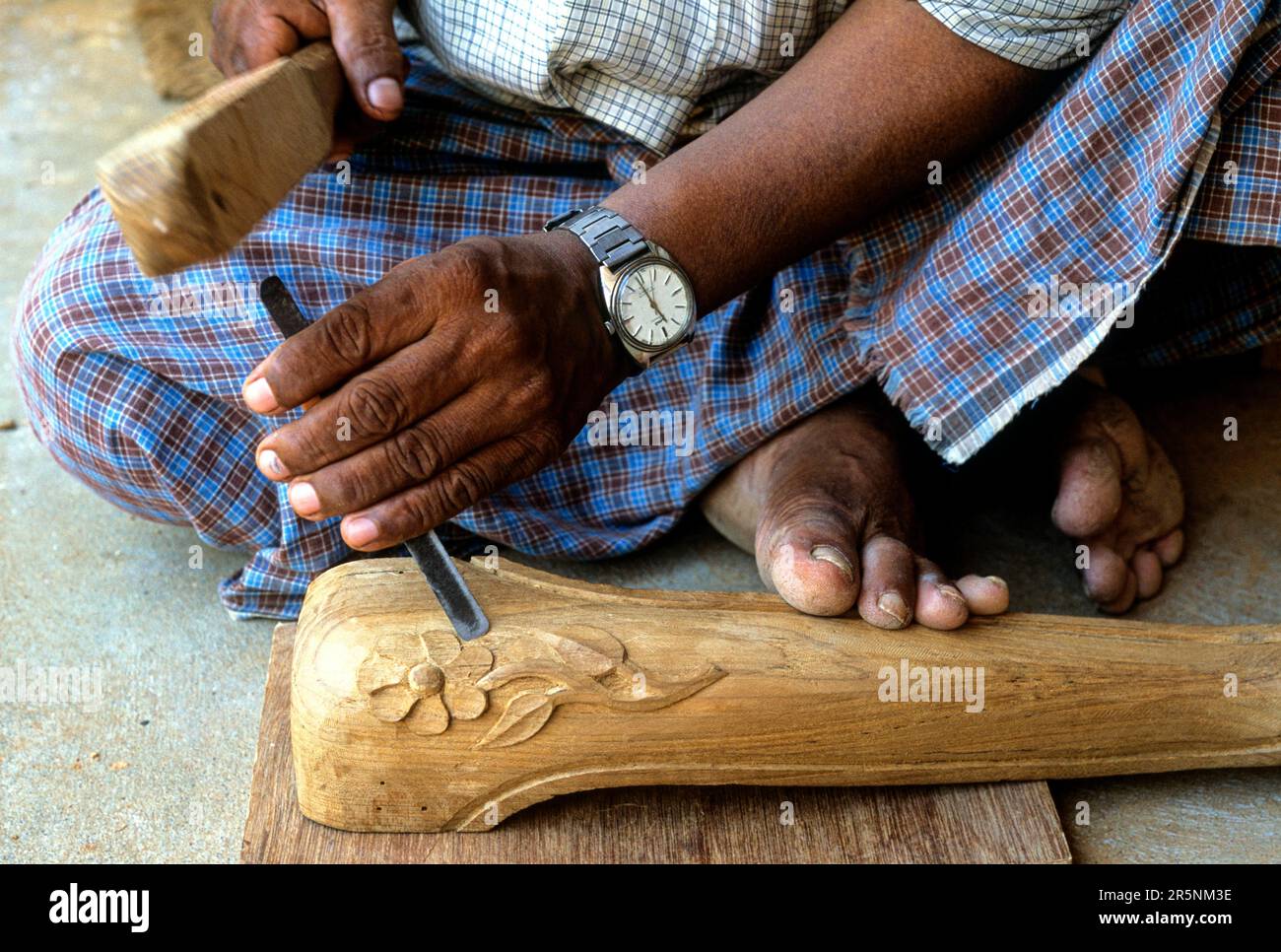 A carpenter carving wood at Coimbatore, Tamil Nadu, South India, India