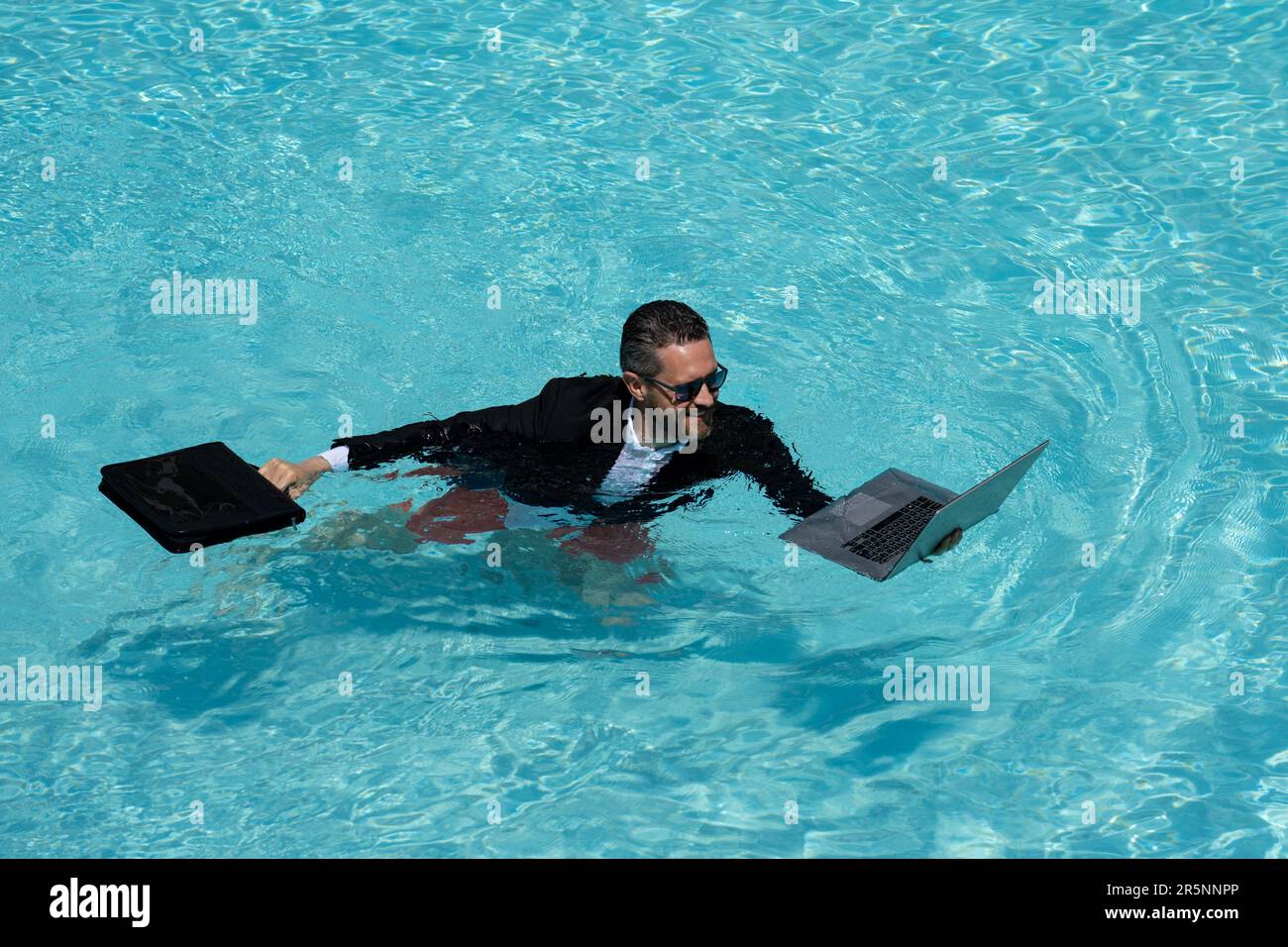 Good looking man in swimming pool hi-res stock photography and images -  Page 2 - Alamy