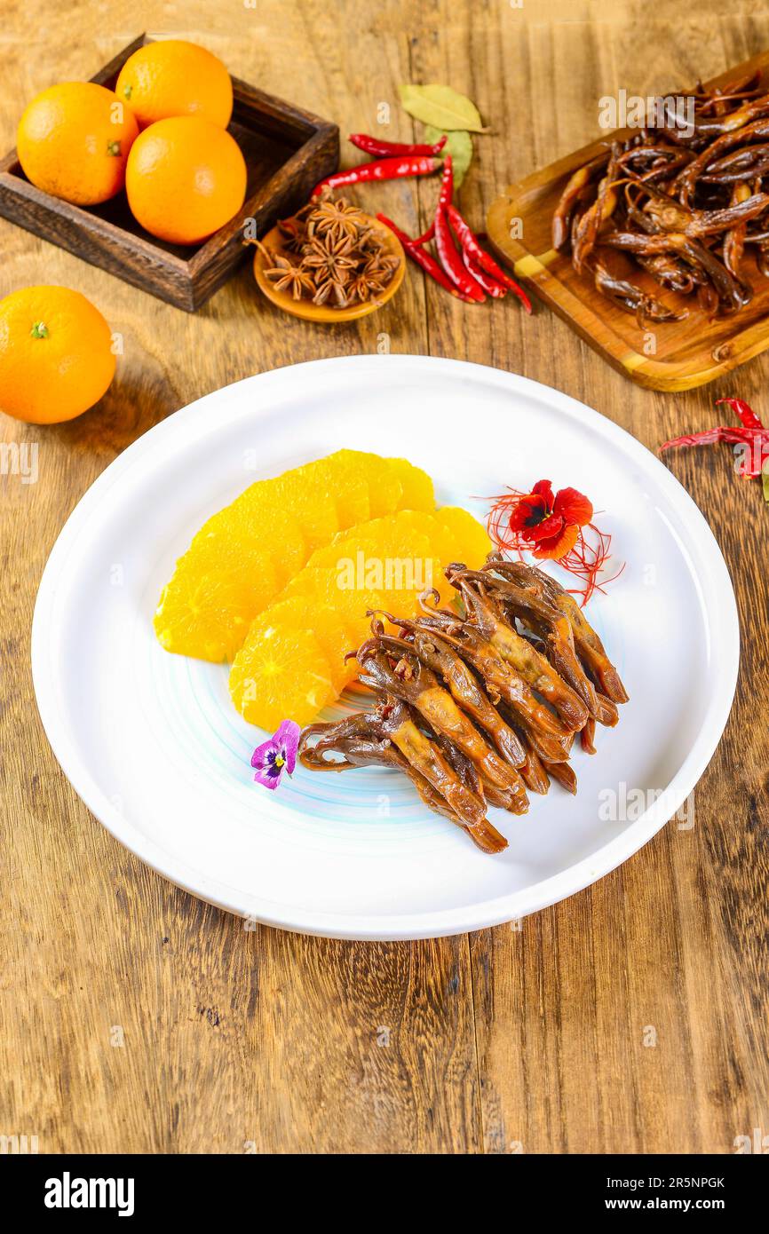 Traditional delicious marinated spicy duck tongue Stock Photo Alamy