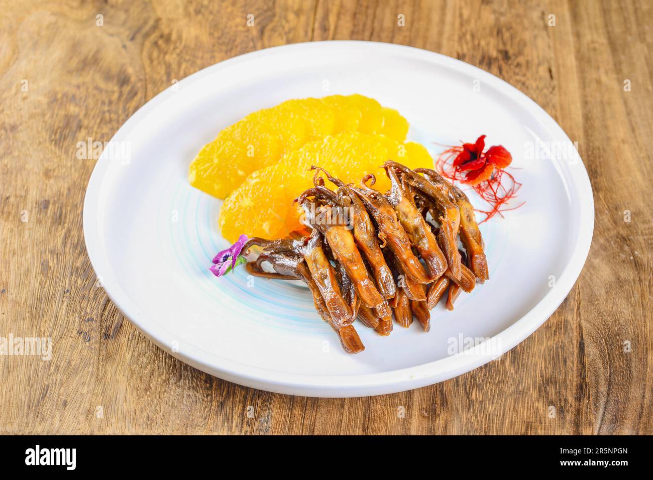 Traditional delicious marinated spicy duck tongue Stock Photo Alamy