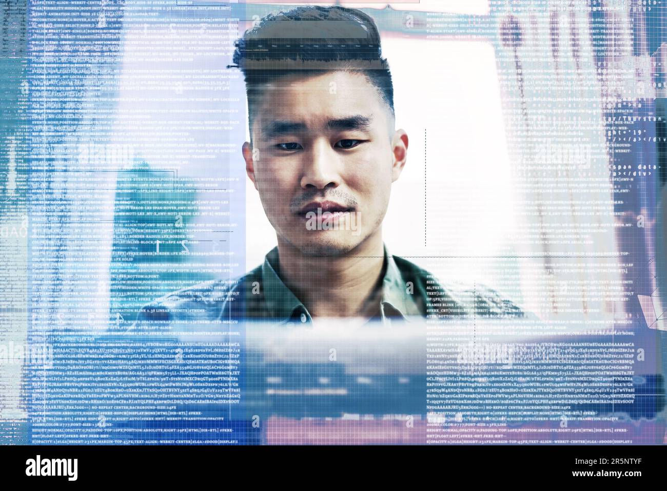 Hes an expert coder. a handsome young male coder working on his laptop at home. Stock Photo