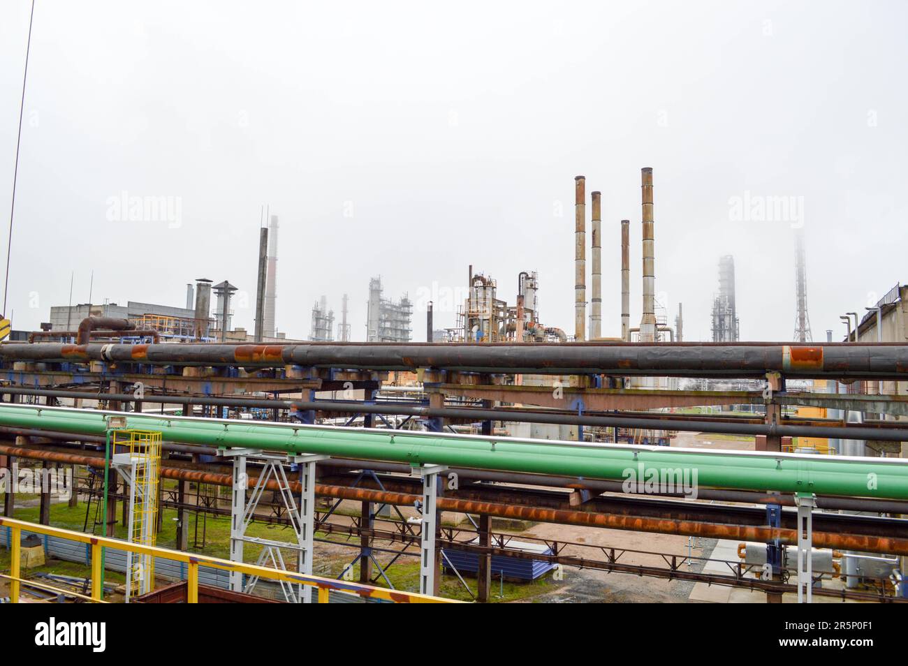 View of the petrochemical factory. Pipelines, columns. Refinery Stock