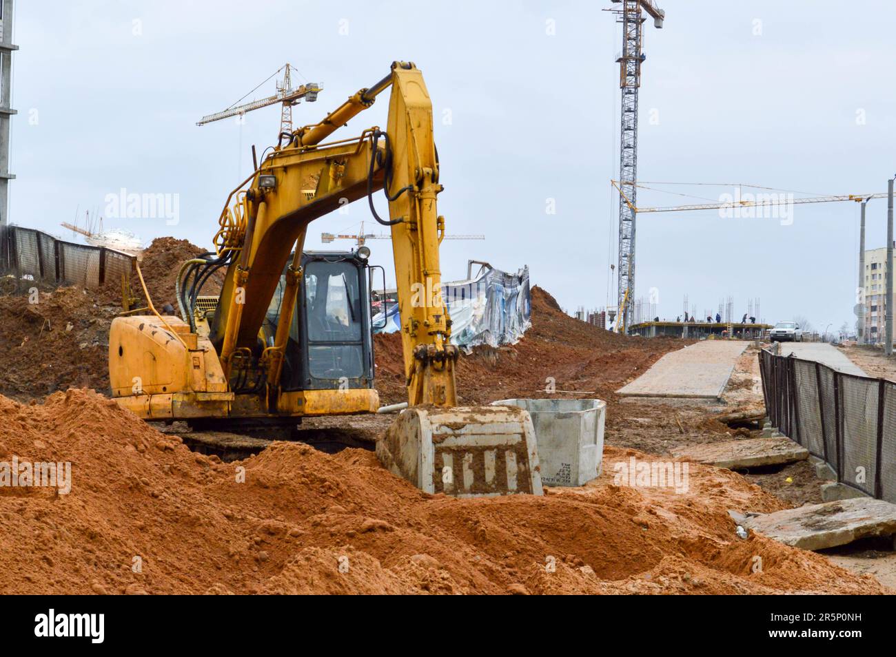Big bright yellow powerful industrial heavy excavator tractor