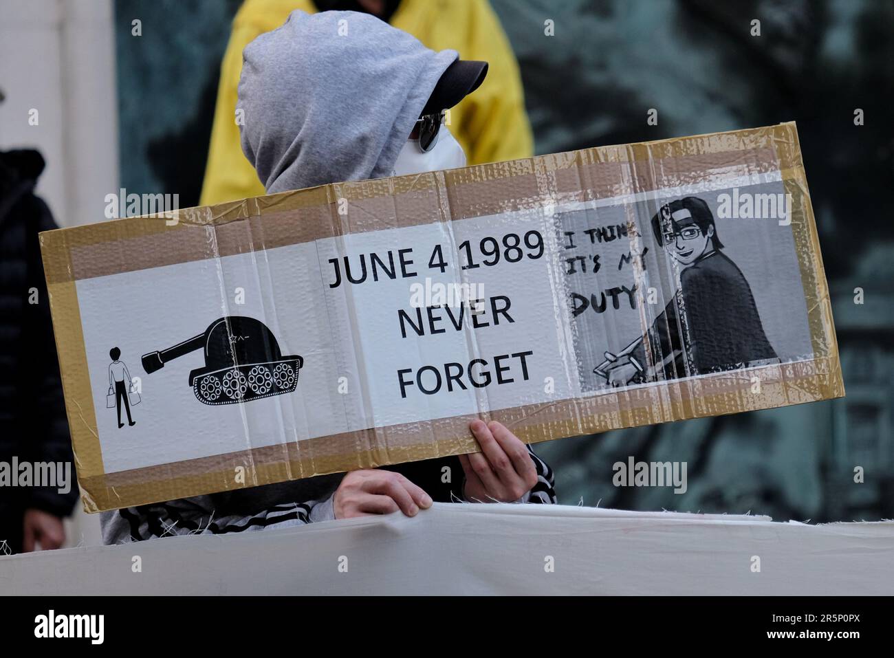 London, UK. A vigil marking the June 4th Tiananmen Square incident crushing pro-democracy student protest takes place opposite the Chinese Embassy. Stock Photo