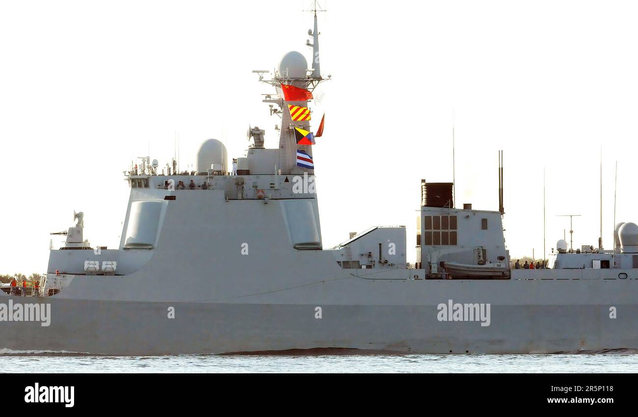 The Chinese guided-missile destroyer Jinan is seen departing Naval Station Mayport, in Jacksonville, following a scheduled multi-day goodwill port visit. Three People’s Liberation Army Navy (PLAN) ships arrived at the Mayport base on November 2, 2015 as part of an around-the-world deployment after completing port calls in Europe. Stock Photo