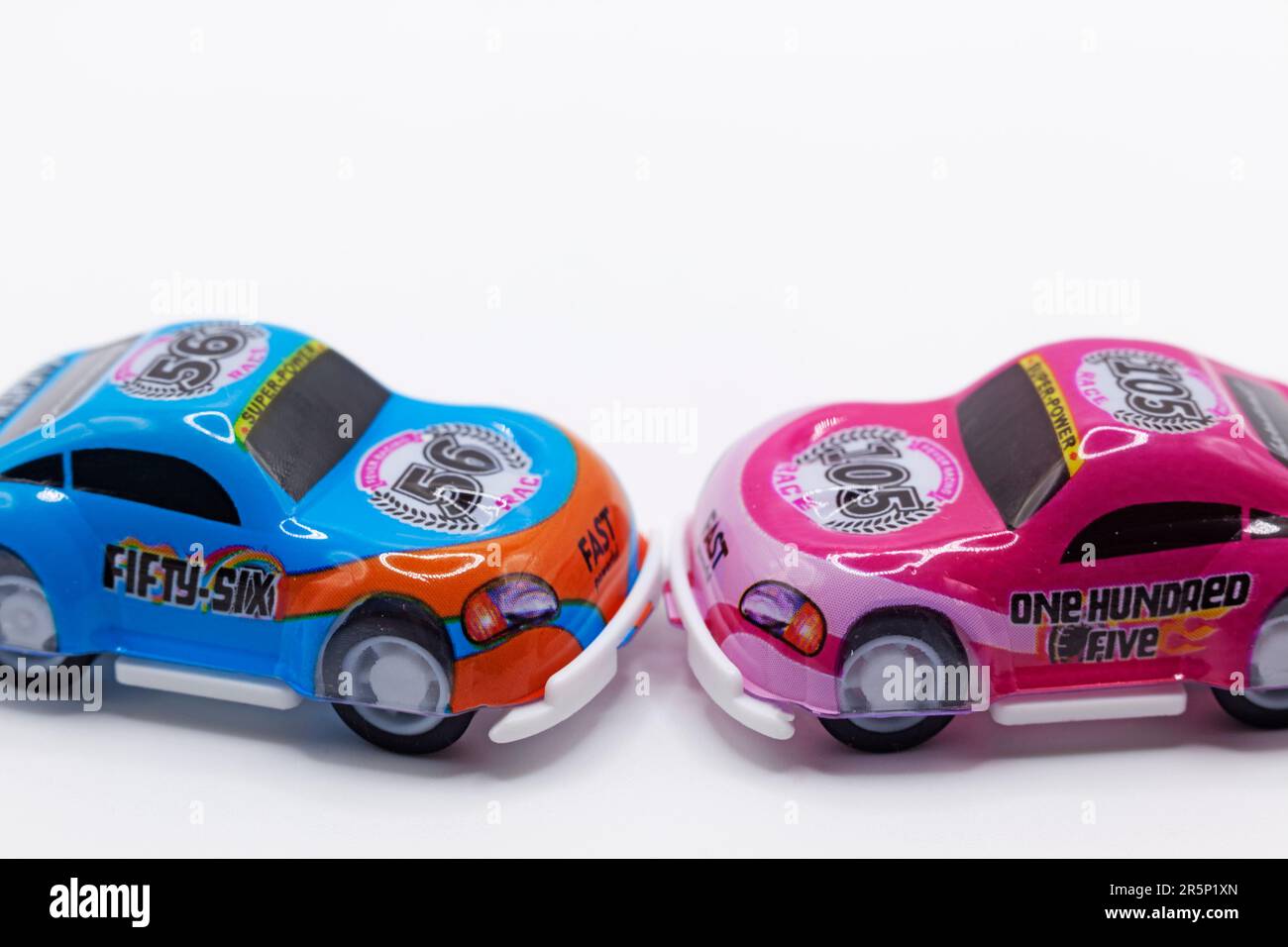 Umea, Norrland Sweden - March 23, 2023: two toy cars on white background collide Stock Photo