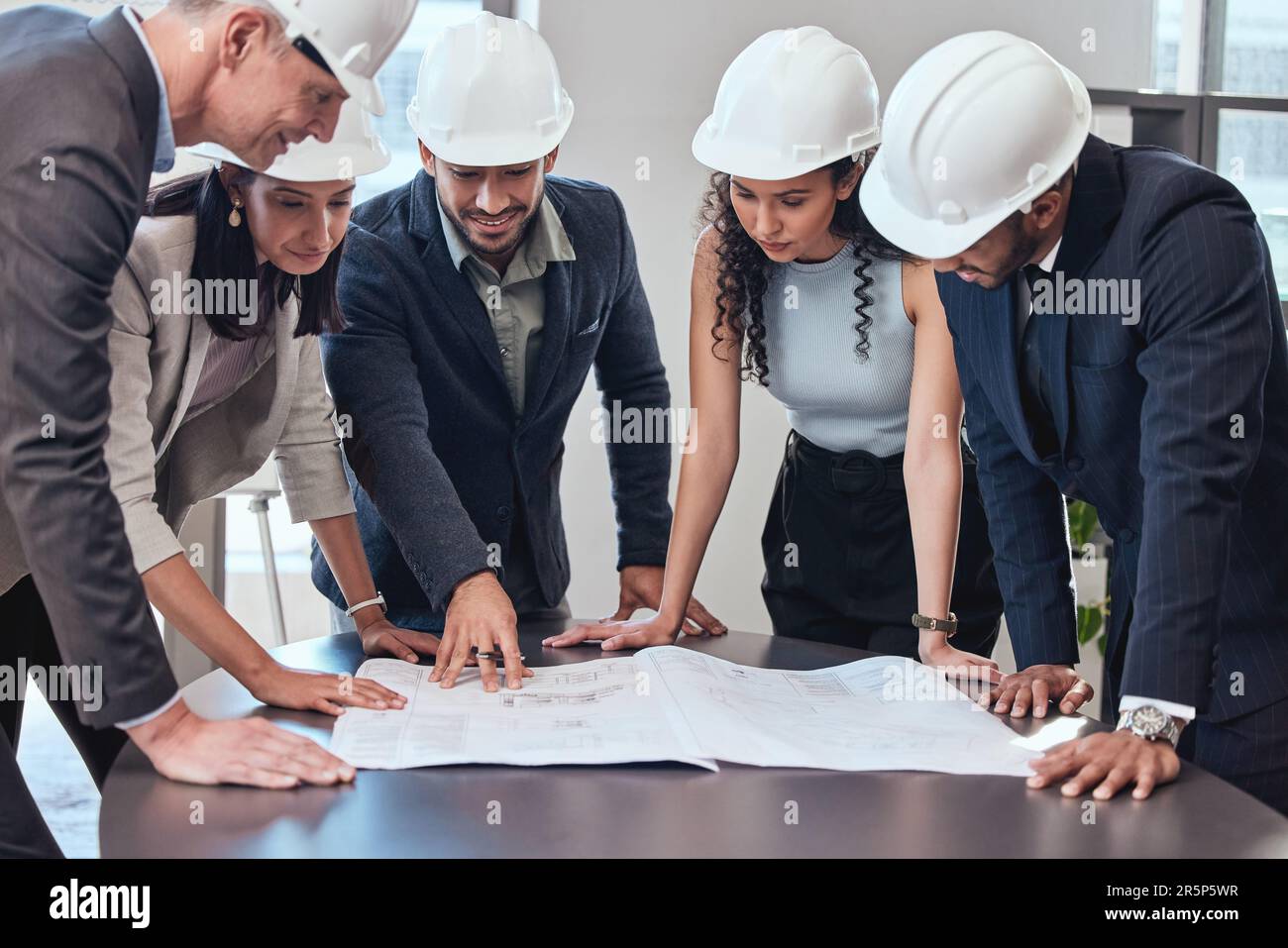 Collaboration, architecture and blueprint with people in meeting for ...