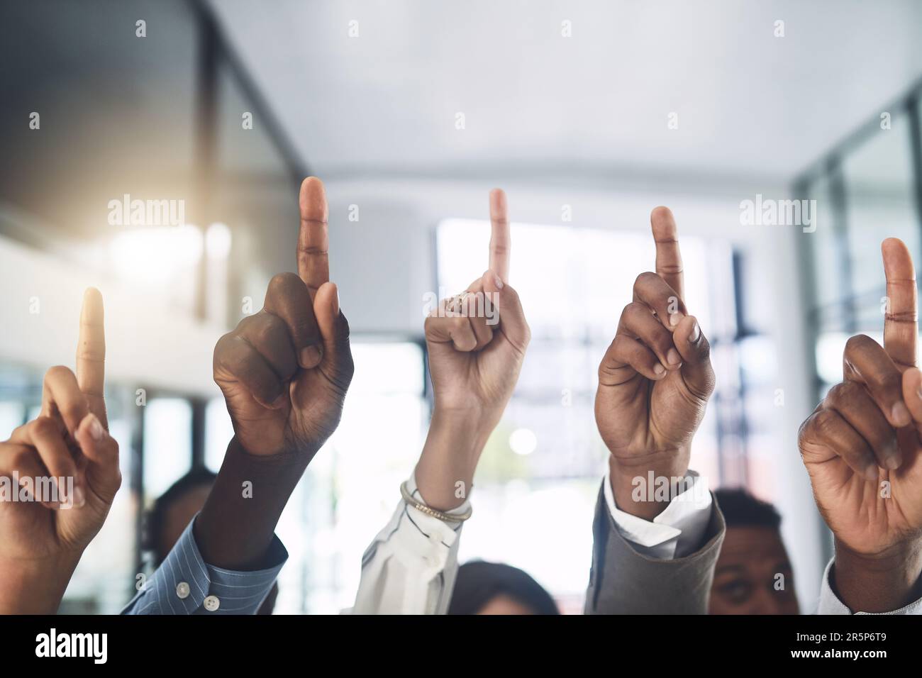 Woman raising hand volunteer hi-res stock photography and images - Alamy