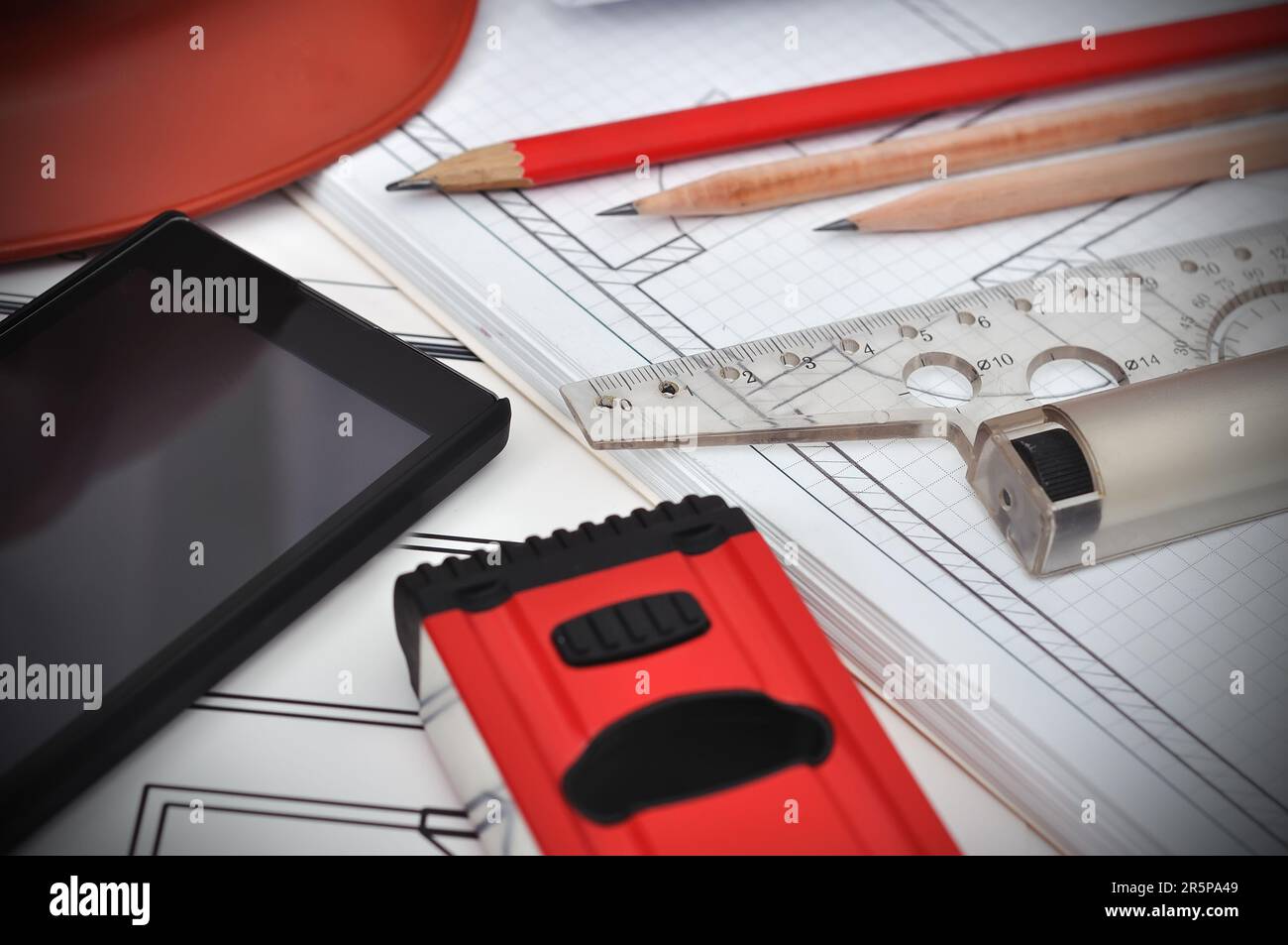 Blueprint, phone and tools on the desktop, workspace engineer Stock Photo