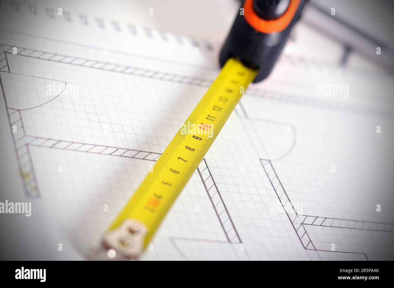 Rolls of architectural house plans. Close up Stock Photo