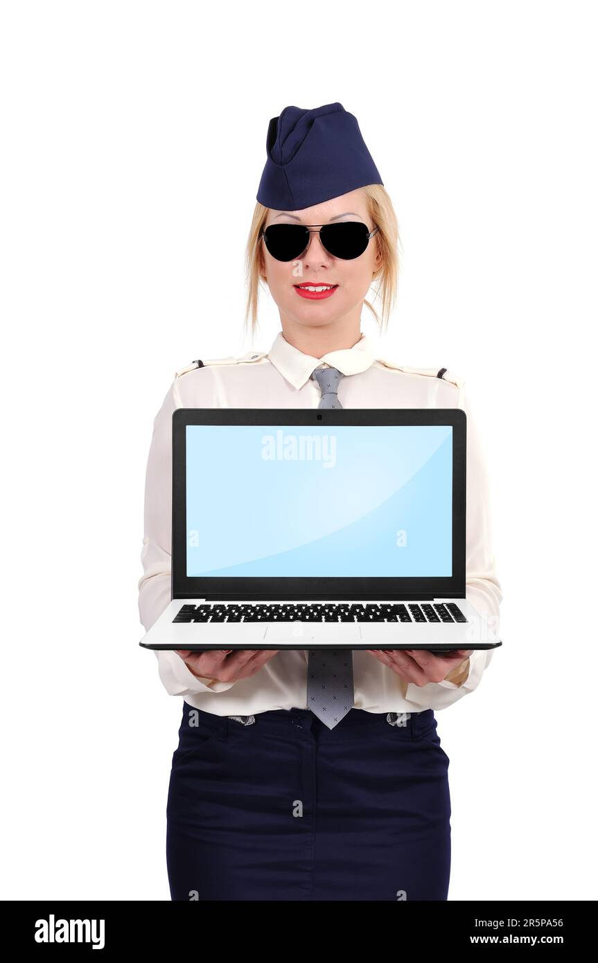 Flight attendant holding open laptop on white background Stock Photo ...