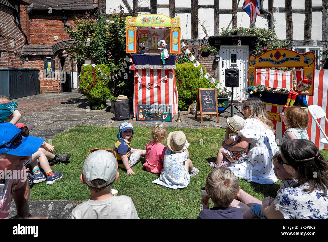 Punch and Judy show children's traditional and historic entertainment on the village green