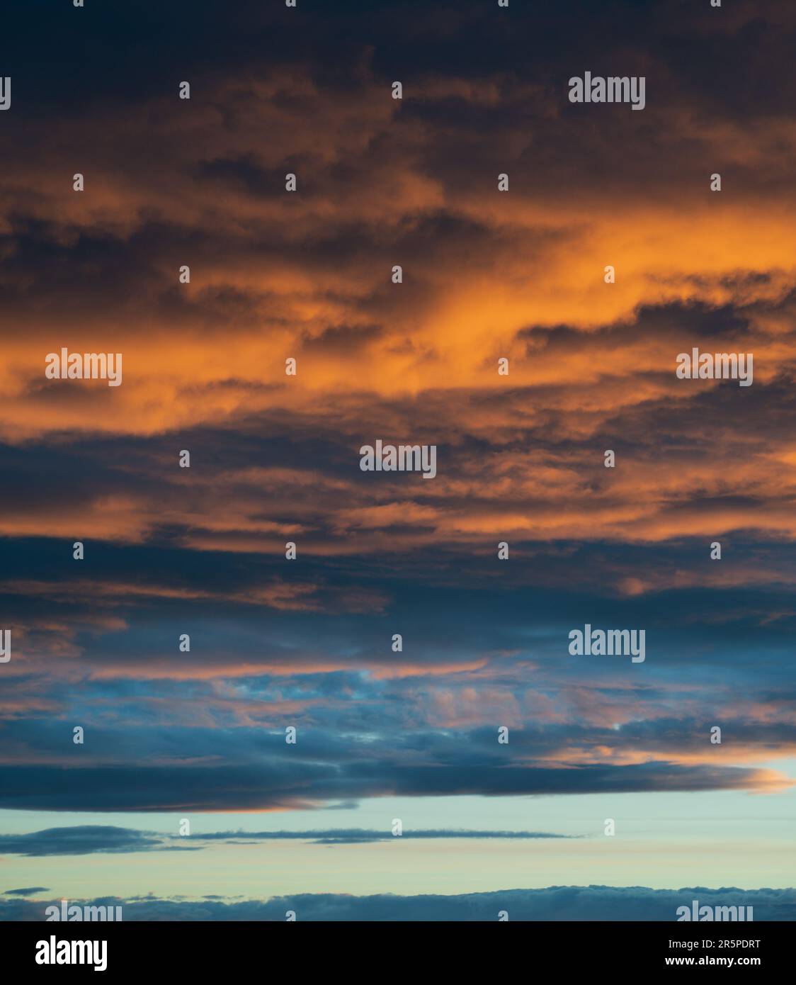 Sunset sky with orange clouds. Nature background Stock Photo - Alamy