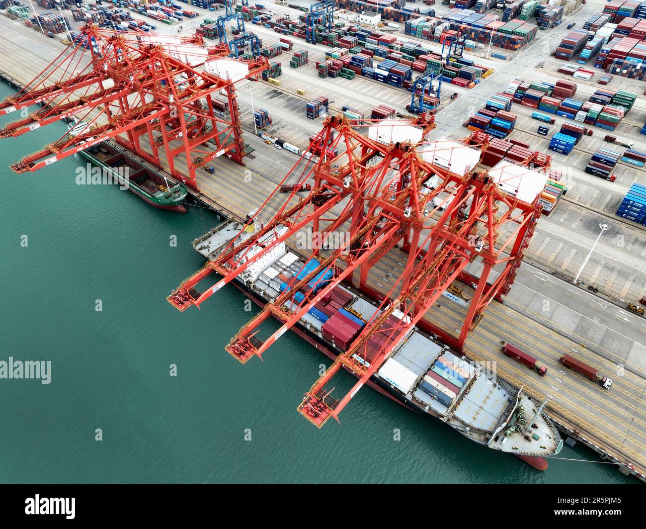 LIANYUNGANG, CHINA - JUNE 5, 2023 - Cargo ships stop at their berths to ...