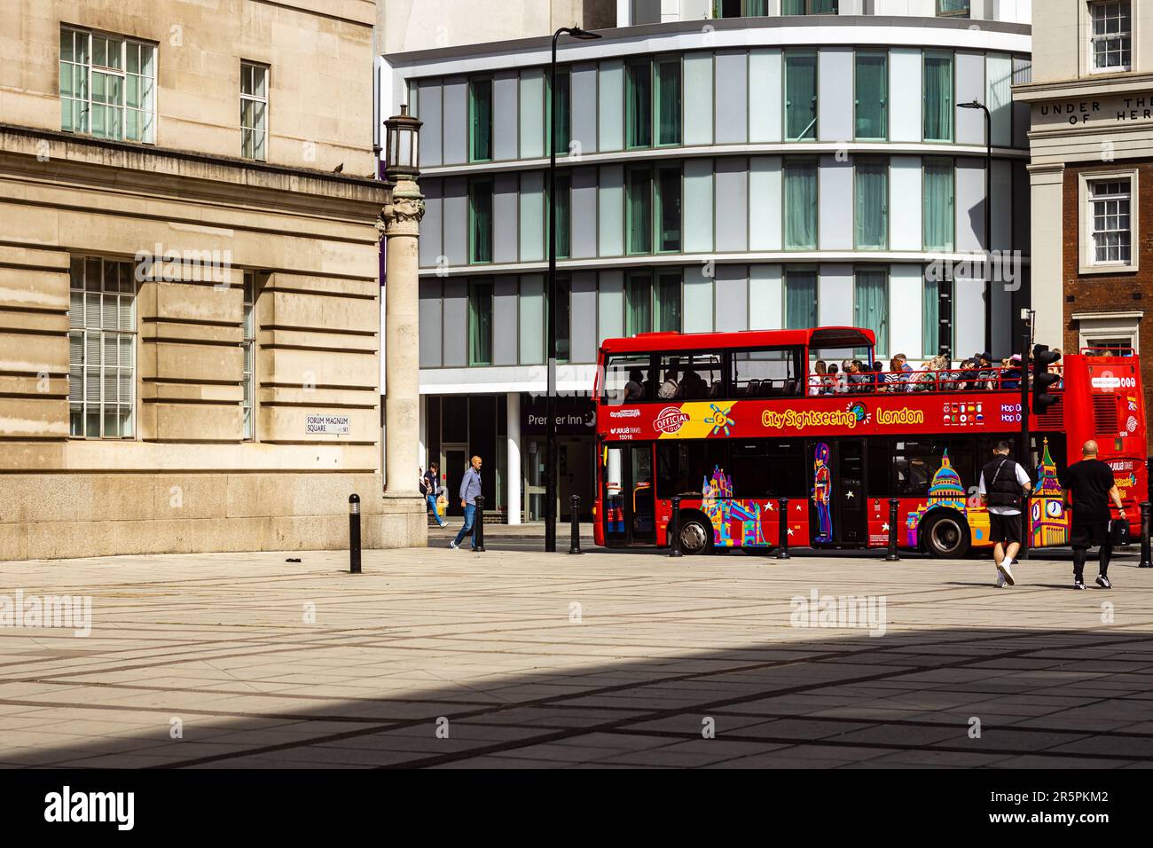 London, 29th May 2023: A City Sightseeing Bus is driving beside Forum Magnum Square. Stock Photo