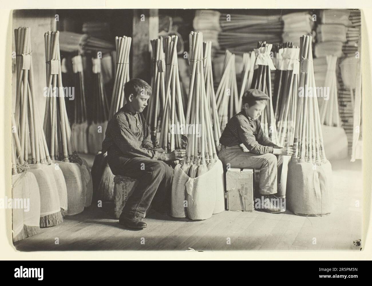 Boys in Packing Room, Brown Mfg. Company, Evansville, Ind. Date: October 1908 Artist: Lewis Wickes Hine American, 1874–1940 Stock Photo