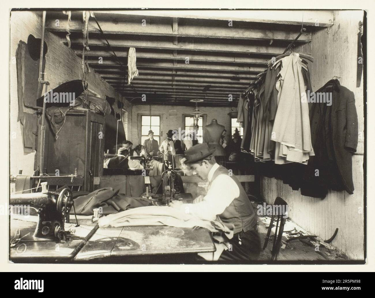 Old Time Garment Shop, New York City Date: 1912 Artist: Lewis Wickes Hine American, 1874–1940 Stock Photo