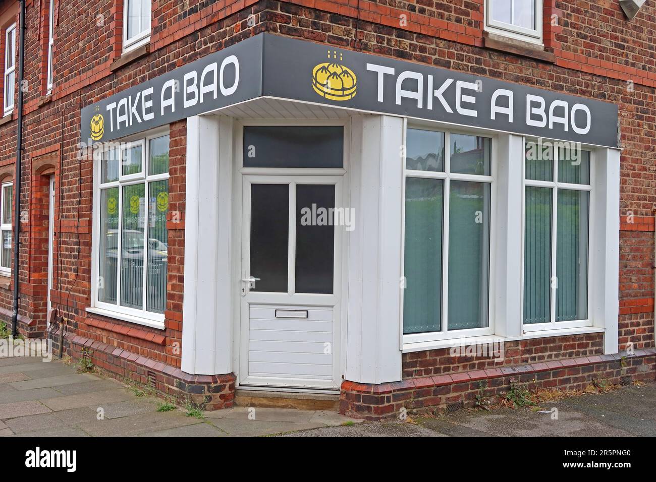 Exterior of Take a Bao, an independent street-food cafe specialising in bao buns, located on Wilderspool Road in south Warrington, Cheshire. Stock Photo