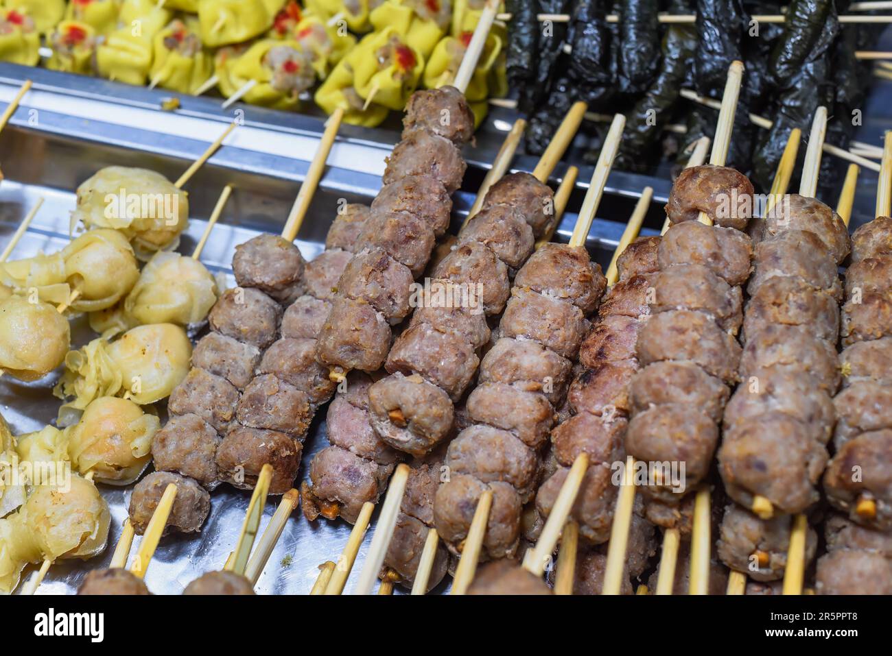 Many meat skewers kebab in vietnamese night market in food festival Stock Photo