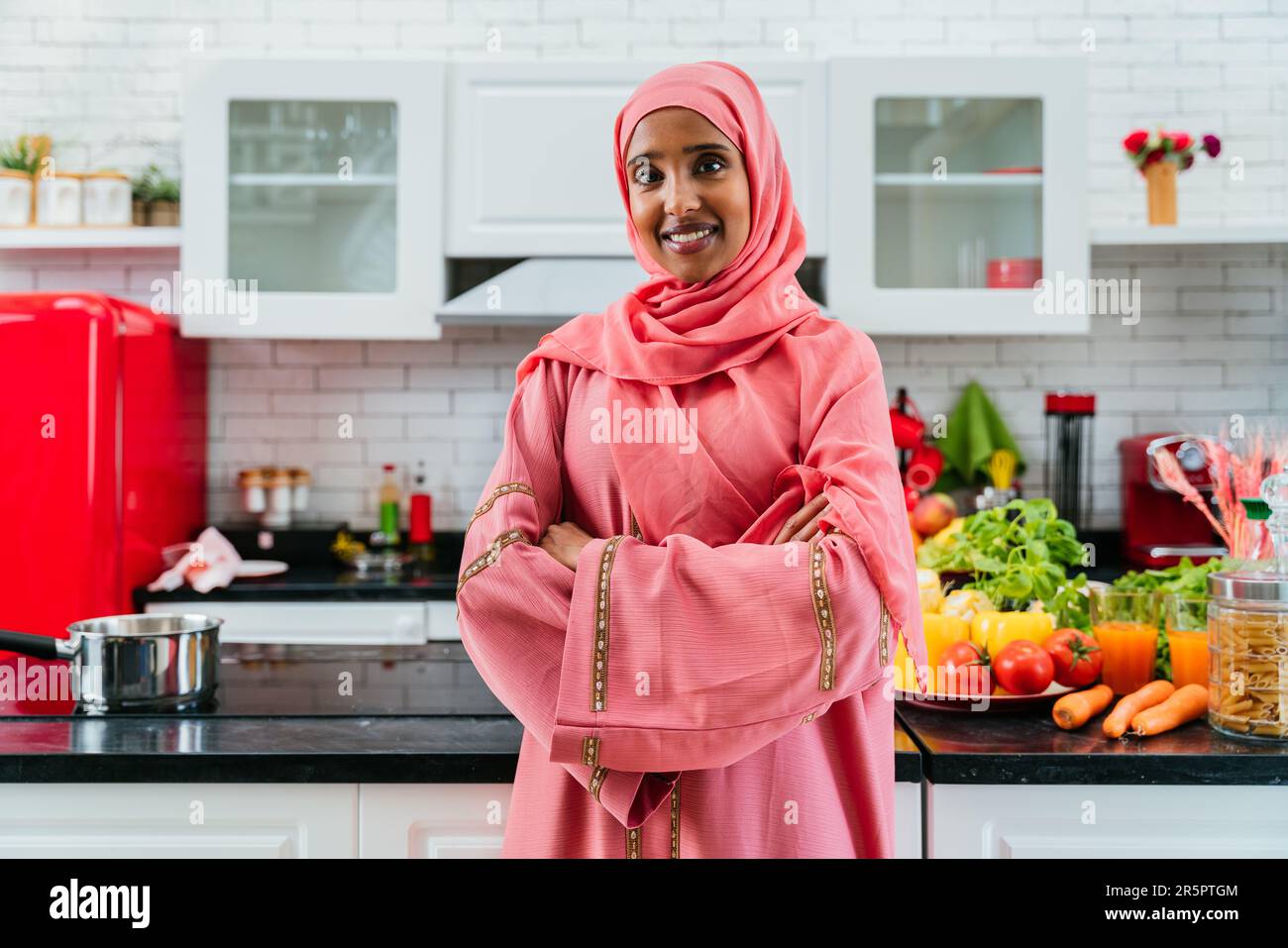 Happy middleeastern woman wearing abaya at home Beautiful muslim