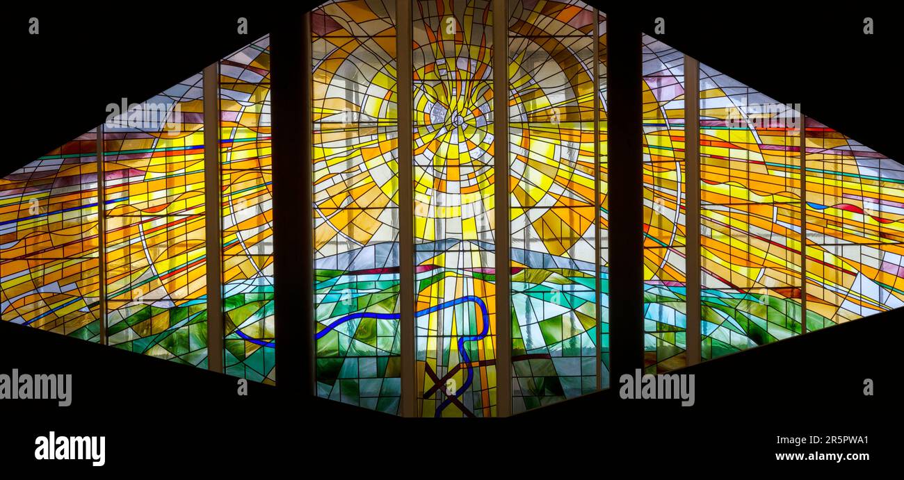 The 20th century celebratory stained glass window in St Joseph's Church, Wetherby, Yorkshire, UK Stock Photo