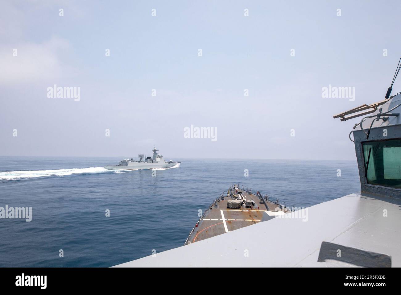 Washington, United States. 03rd June, 2023. The Arleigh Burke-class guided-missile destroyer USS Chung-Hoon (DDG 93) observes PLA(N) LUYANG III DDG 132 (PRC LY 132) execute maneuvers in an unsafe manner while conducting a routine south-to-north Taiwan Strait transit alongside the Halifax-class frigate HMCS Montreal (FFG 336), on June 3, 2023. Photo by U.S. Navy/UPI Credit: UPI/Alamy Live News Stock Photo