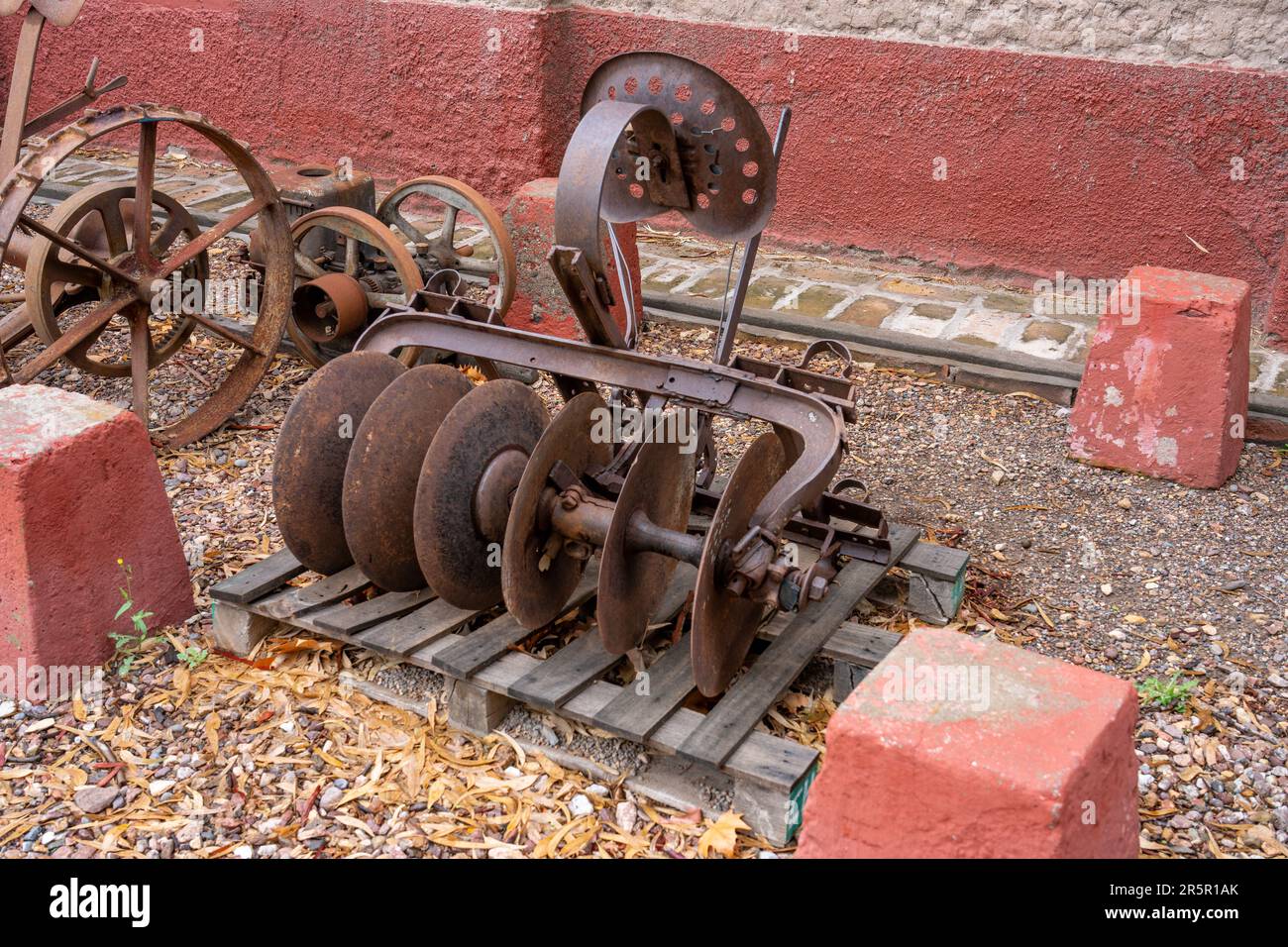 An antique horse-drawn disc harrow at La Abeja Farm & Winery, San