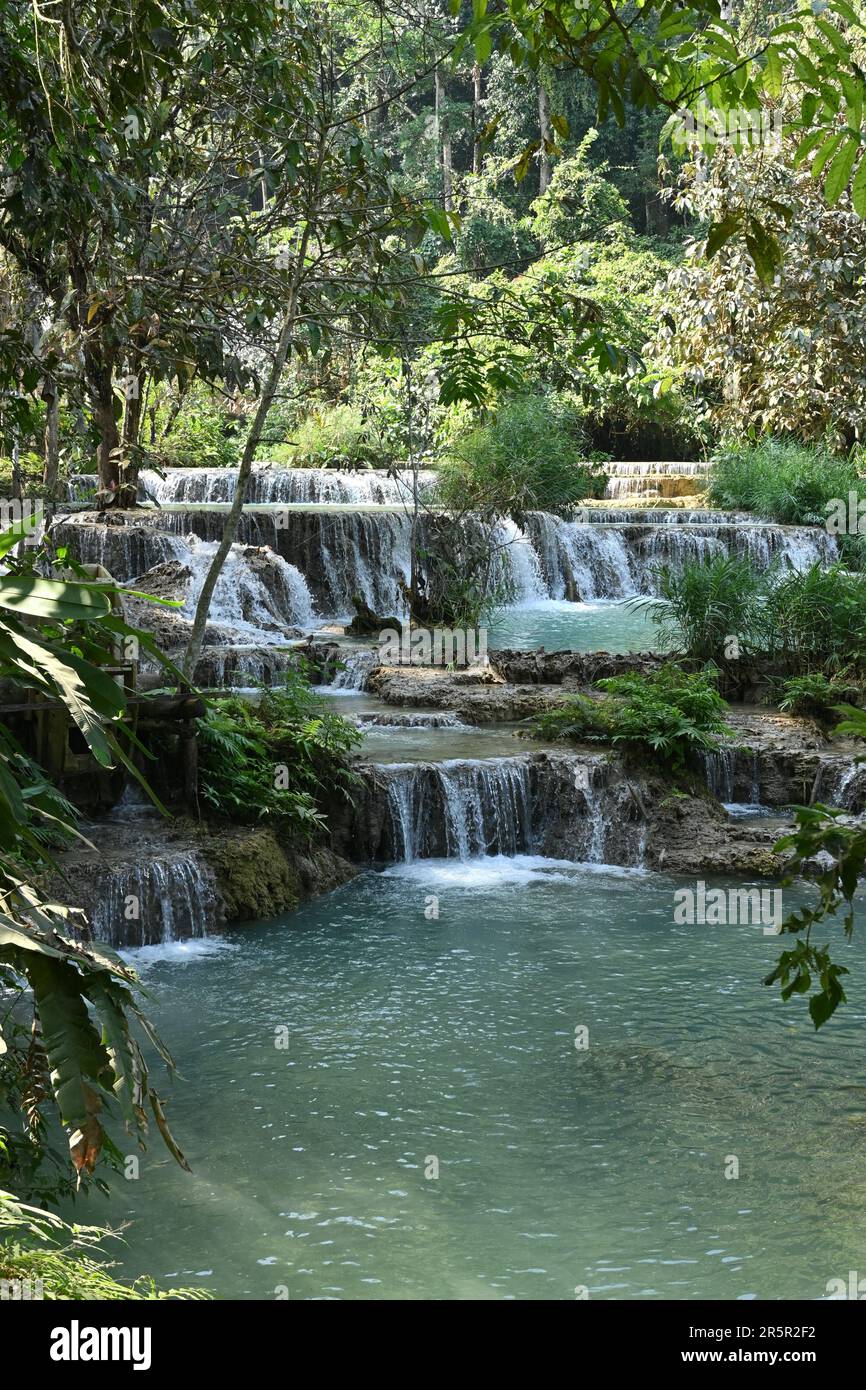 View of Kuang Si waterfalls, a three-tiered waterfall about 29km south of Luang Prabang, Laos Stock Photo