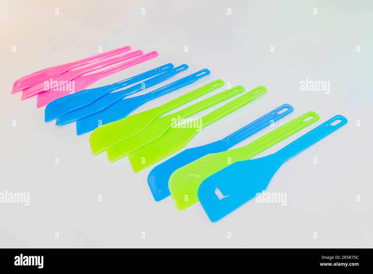 The Colorful Plastic Spatula Set includes spatulas in vibrant shades of