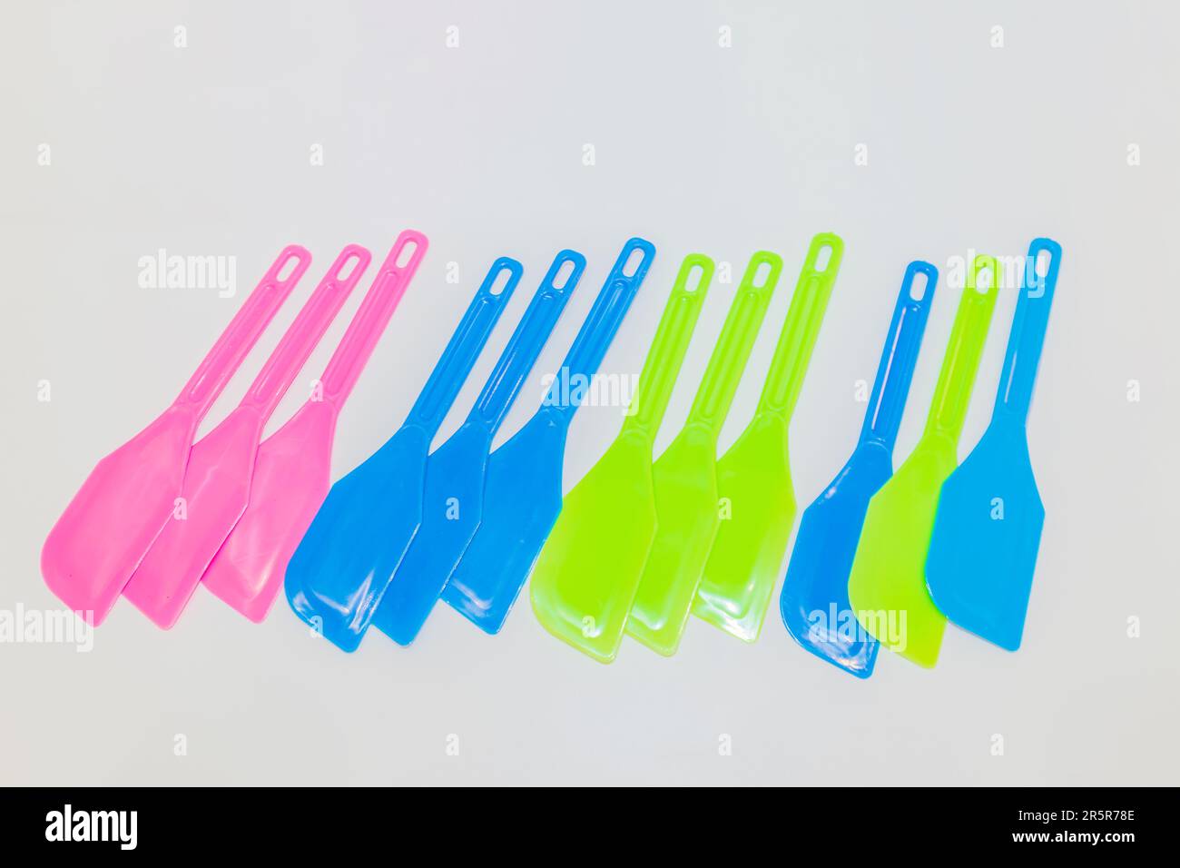The Colorful Plastic Spatula Set includes spatulas in vibrant shades of