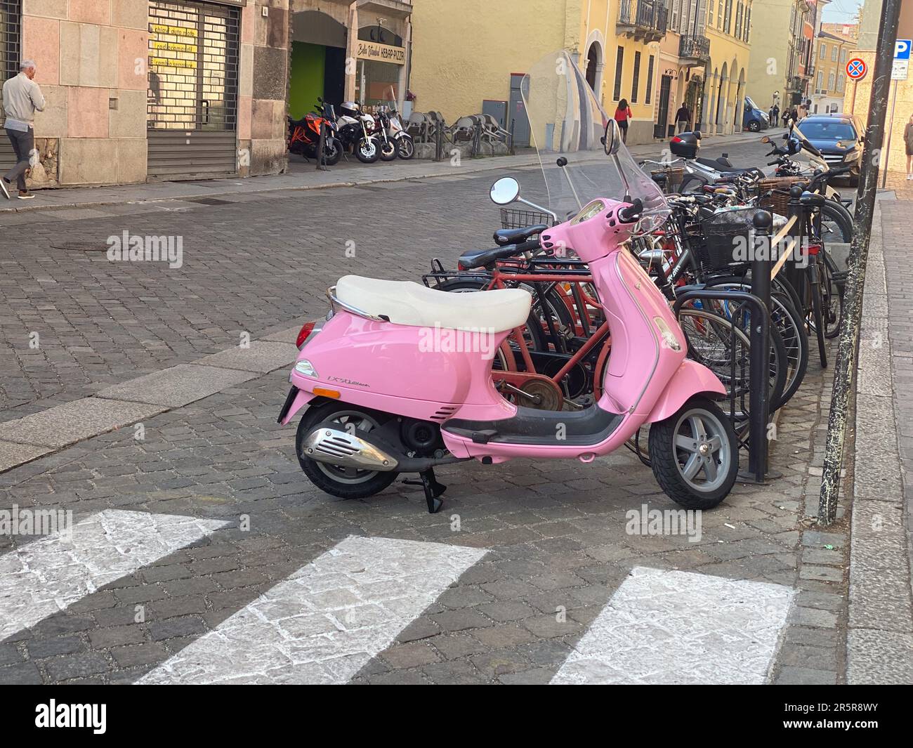 Vespa style pink scooter with flowers in the trunk. Watercolor vector Stock  Vector