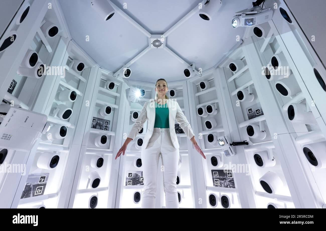 Munich, Germany. 05th June, 2023. Judith Gerlach (CSU), Bavarian Minister of Digital Affairs, stands in a full-body scanner during a press conference in the crime scene virtual reality room (holodeck) of the Bavarian State Criminal Police Office (LKA). The scanner can create a virtual photorealistic 'copy' of a user. The room was unveiled after several years of development. Thanks to high-tech and VR goggles, crime scenes can be accurately recreated and walked through there in three dimensions, a unique feature in Germany. Credit: Sven Hoppe/dpa/Alamy Live News Stock Photo