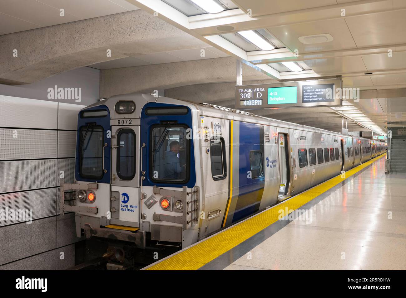 June 4, 2023, New York, New York, United States Commuters board a train bound for Babylon on a