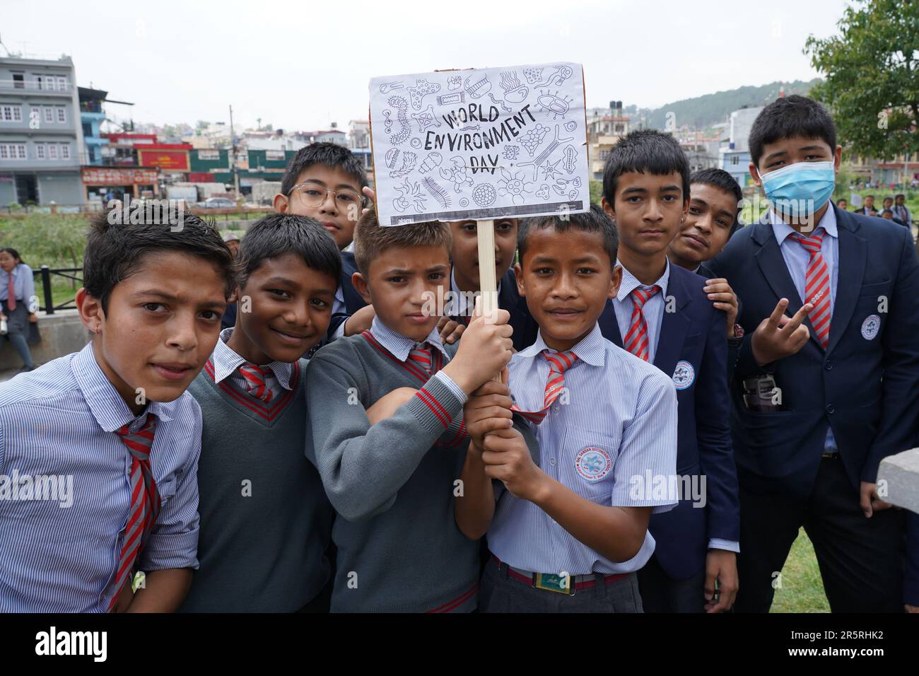 Kathmandu, Nepal. 5th June, 2023. Students hold a placard aimed at