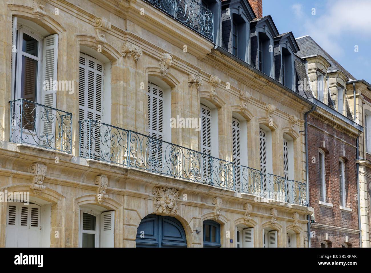 France, Eure, Risle Valley, Pont-Audemer, labeled the Most Beautiful Detours of France, nicknamed the Little Venice of Normandy, Rue Sadi-Carnot, stone facade of a luxurious mansion, decorated with bas-reliefs Stock Photo
