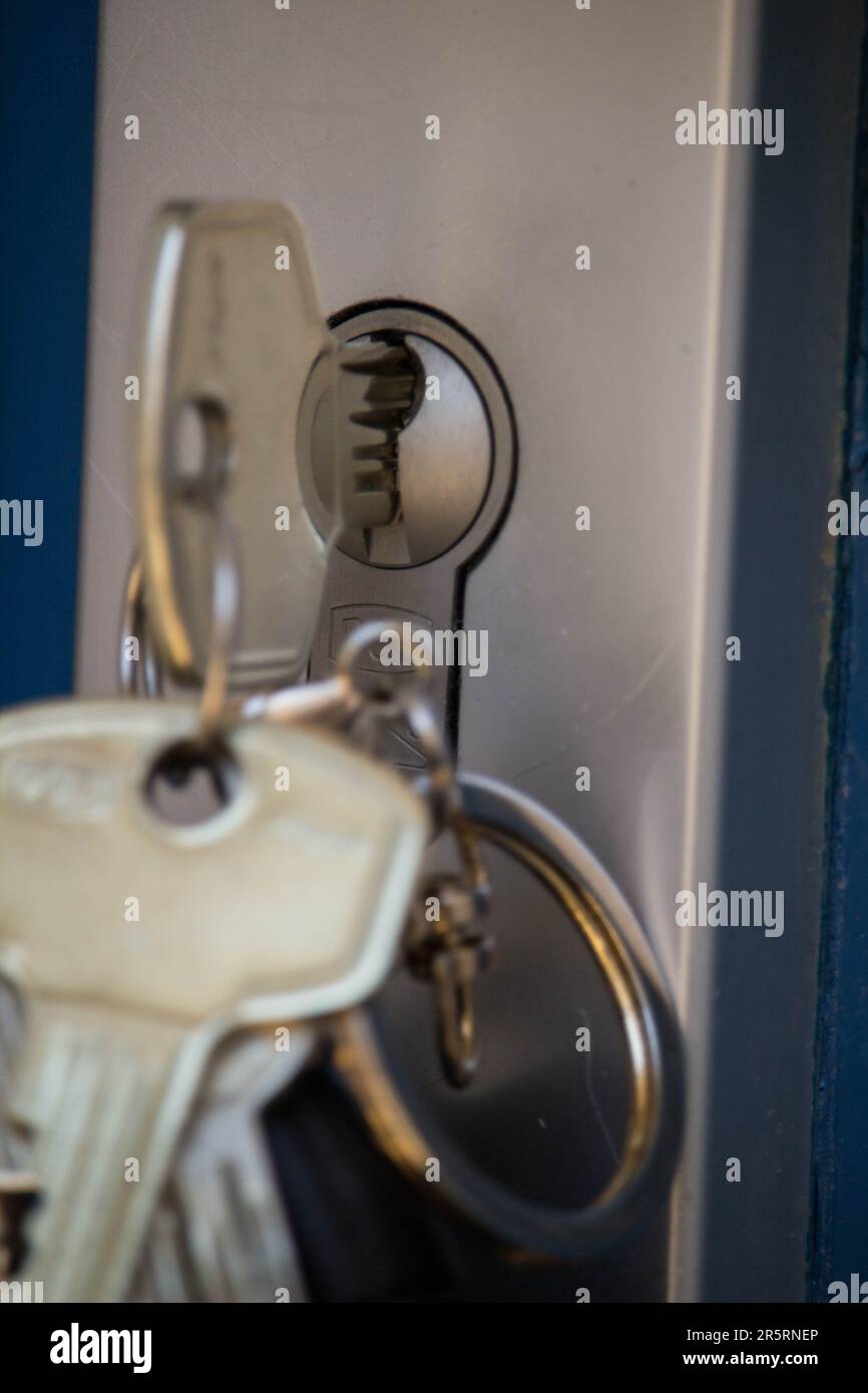 A secure locking mechanism with two keys attached to the handle of a