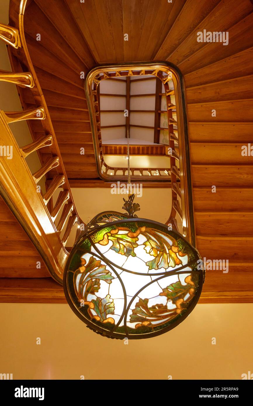 France, Meurthe et Moselle, Nancy, Villa Majorelle also named Villa Jika listed as Maison des Illustres by architect Henri Sauvage in Art Nouveau Ecole de Nancy (Nancy school) style, the staircase, railing drawn by Henri Sauvage made in Louis Majorelle workshop and the chandelier with a decoration of sea weeds by Louis Majorelle Stock Photo