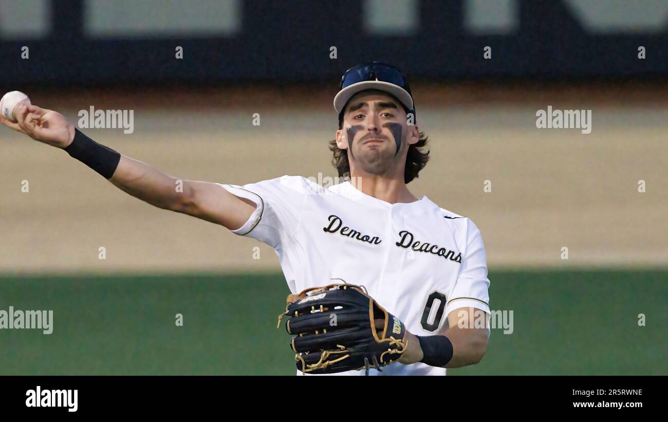 Wake Forest's Lucas Costello (0) makes a throw during an NCAA baseball