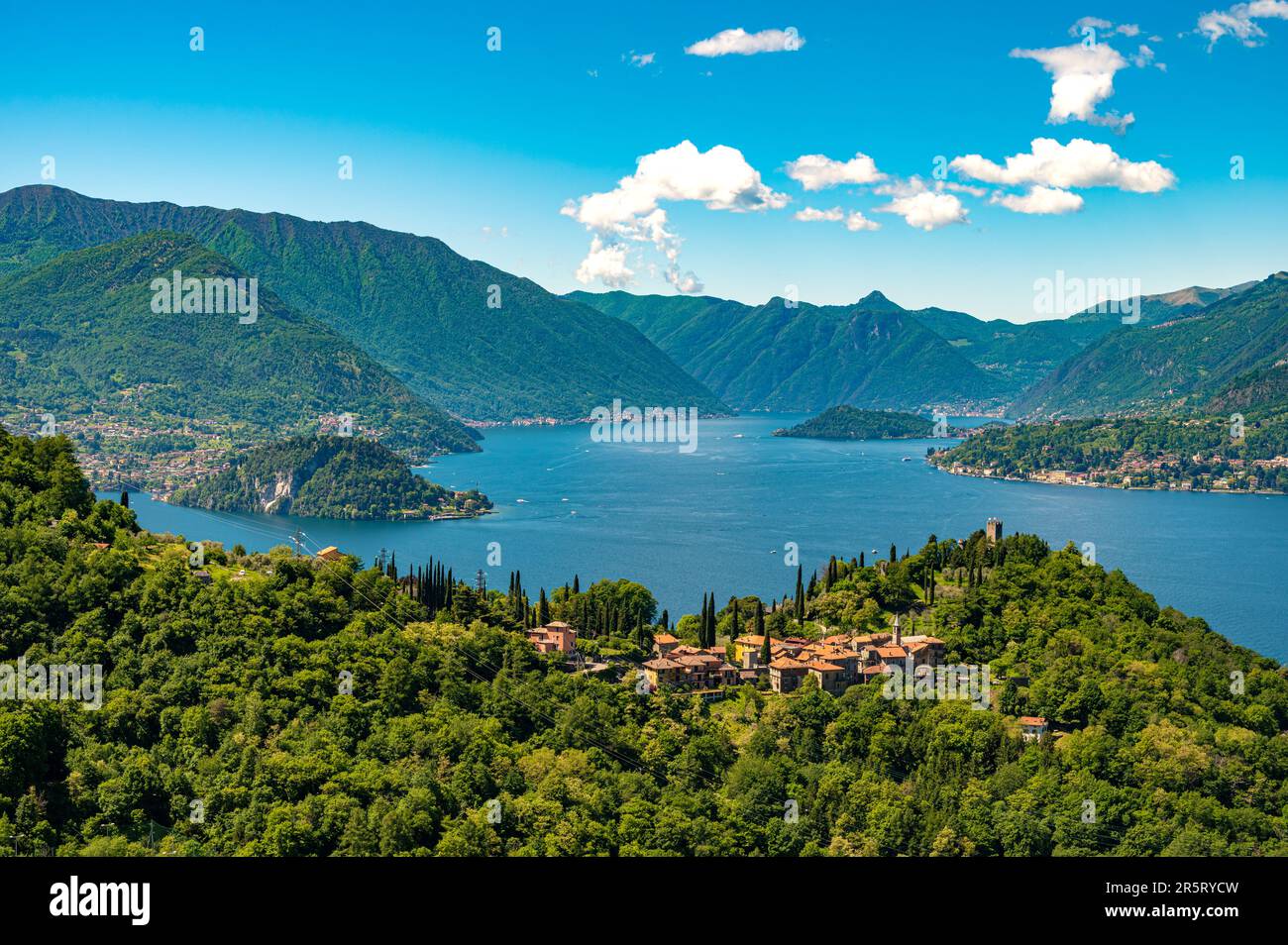 Lake Como, Photographed from Perledo, showing Varenna, Bellagio, Castello di Vezio, and Punta Balbianello, on a spring day. Stock Photo