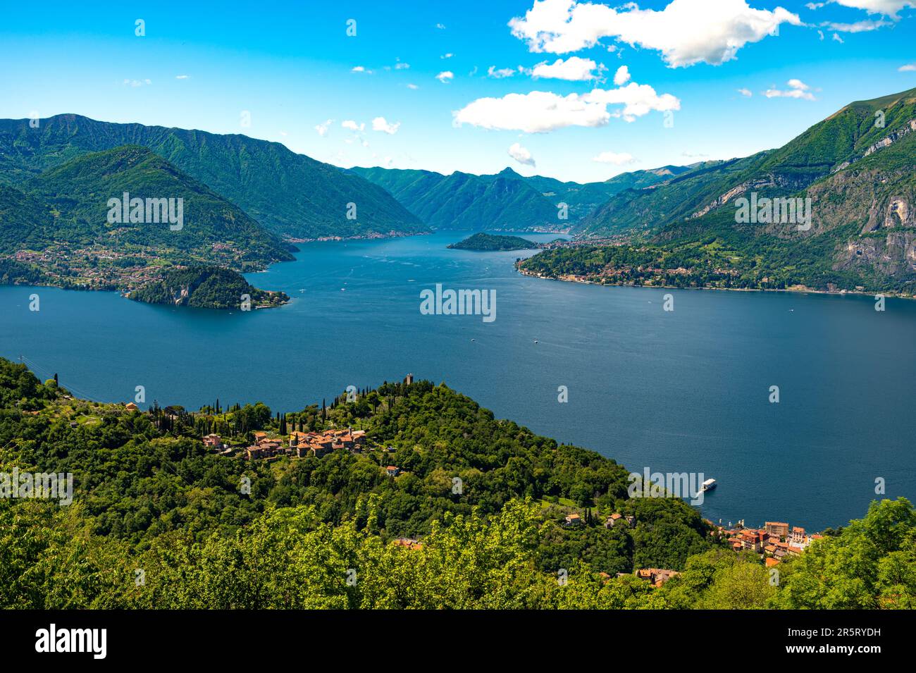 Lake Como, Photographed from Perledo, showing Varenna, Bellagio, Castello di Vezio, and Punta Balbianello, on a spring day. Stock Photo