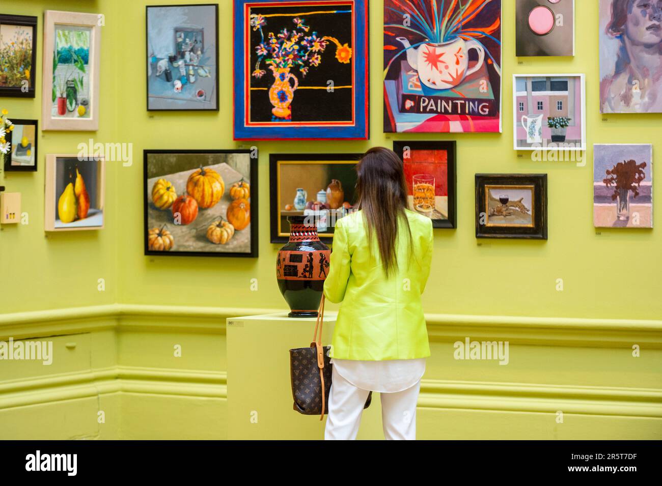 London, UK. 5 June 2023. A visitor views a ceramic 'Reflecting the time