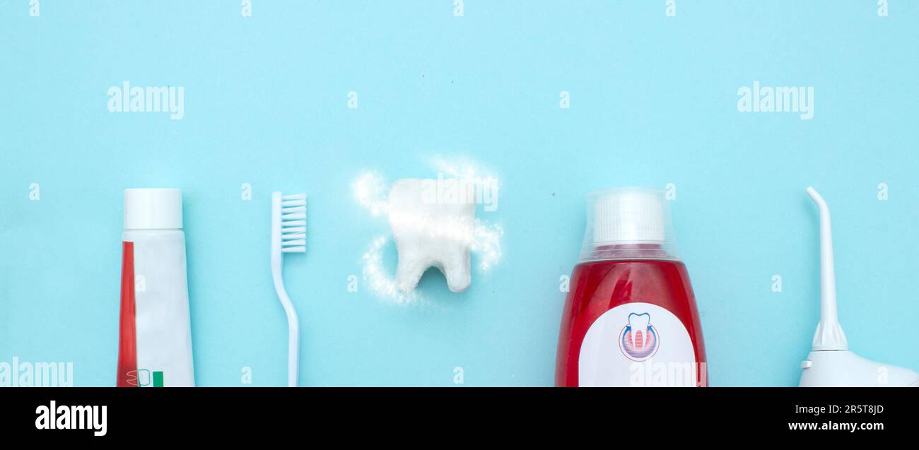 Close up of a toothbrush, toothpaste, irrigator, mouthwash for teeth